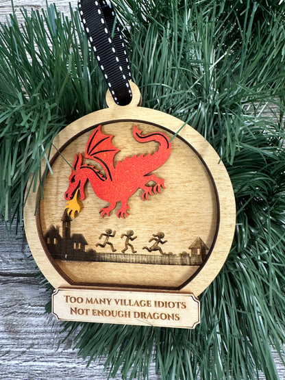 Dragon breathing fire at village idiots Ornament