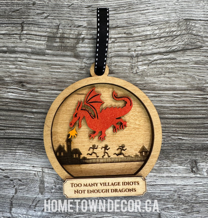 Dragon breathing fire at village idiots Ornament