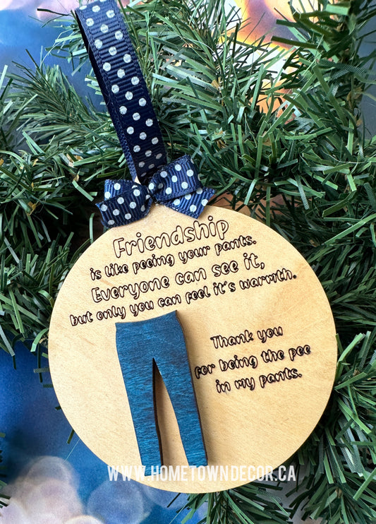 Friendship is like peeing your pants ornament