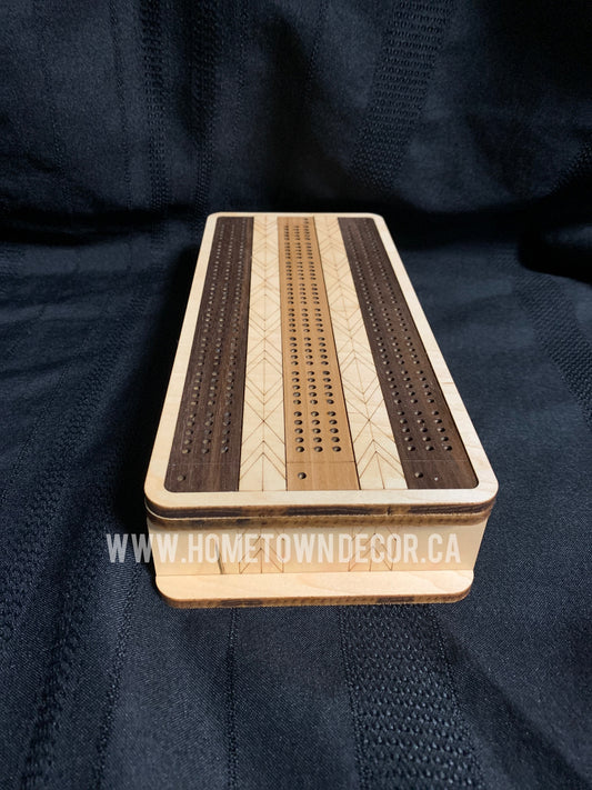 Cribbage board with storage box